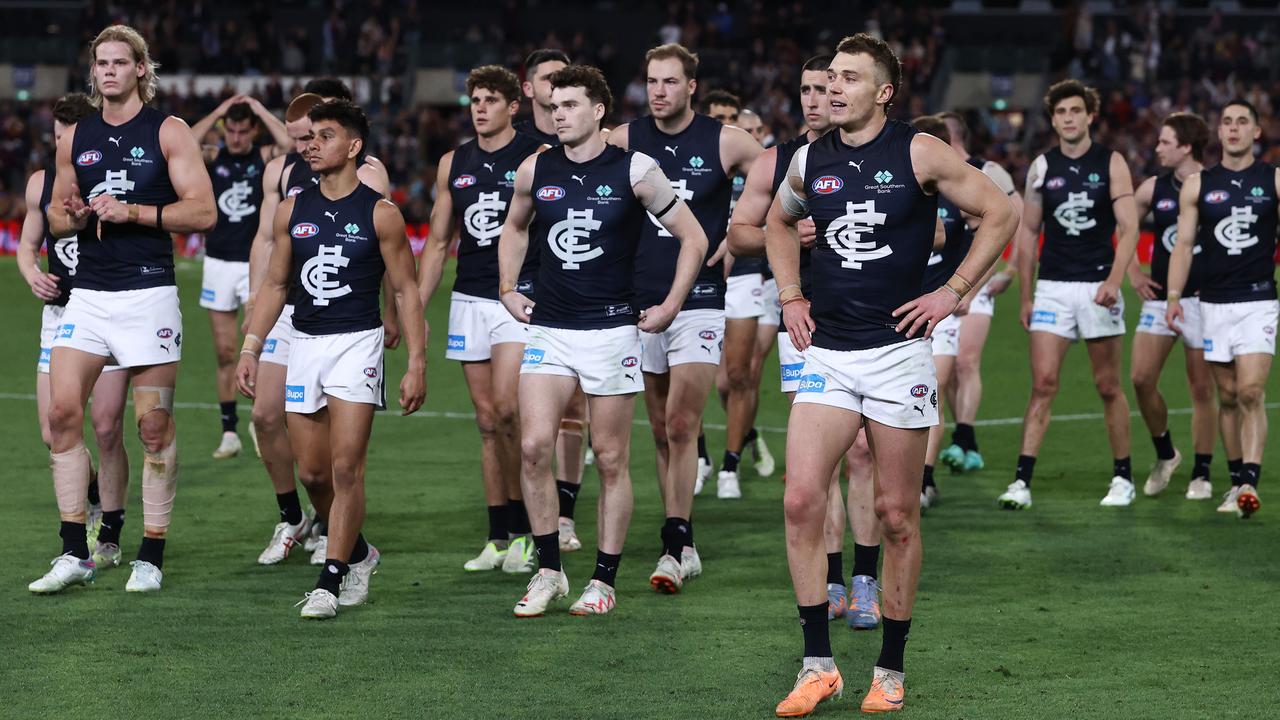 BRISBANE, AUSTRALIA - September 23, 2023. AFL . Patrick Cripps leads the Blues off the ground after the 2nd preliminary final between the Brisbane Lions and the Carlton at the Gabba in Brisbane, Australia.. Photo by Michael Klein.