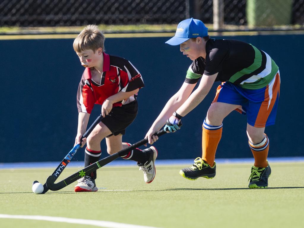 Callum Page (left) of Past High against Austin Quire of Newtown Norths Tigers in under-11 boys Presidents Cup hockey at Clyde Park, Saturday, May 27, 2023. Picture: Kevin Farmer