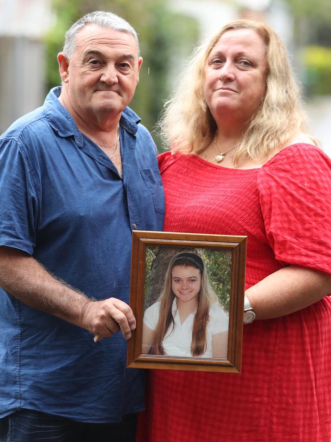 Ron and Leesa Topic with a photo of their daughter Courtney. Picture: John Grainger