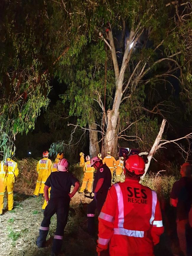 Kinglake SES, firefighters and a specialist search and rescue team work to free the man. Picture: Kinglake SES