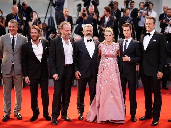 Producer Michael Bassick, actors Luke Bracey, Hugo Weaving, director Mel Gibson, actress Teresa Palmer, actor Andrew Garfield, actor Vince Vaughn attend the premiere of ‘Hacksaw Ridge’ during the 73rd Venice Film Festival at Sala Grande on September 4, 2016. Picture: Getty
