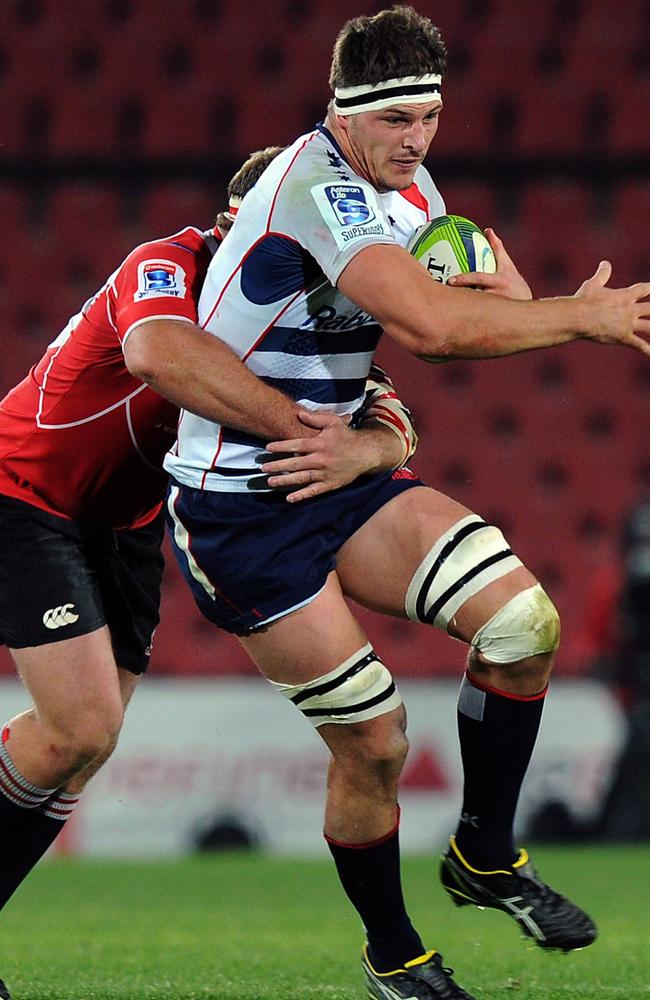 Luke Jones of Rebels (R) is tackled by Schalk van der Merwe (L) of Lions during the Super 15 rugby match between Lions and Rebels at Ellis Park on July 4, 2014 in Johannesburg, South Africa. AFP PHOTO / GORDON HARNOLS