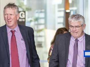 Denis and Neil Wagner leave court during the Brisbane portion of the hearing.