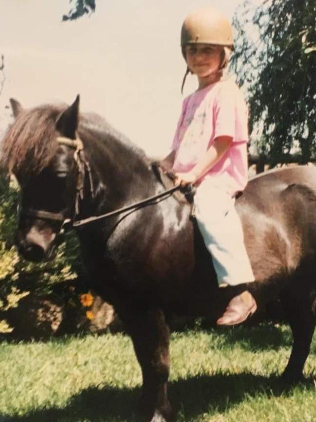 Horse-mad Simone Pearce at three. Picture: Supplied