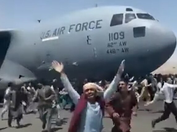 Screen shots from a video posted online of a US military plane leaving Kabul airport.