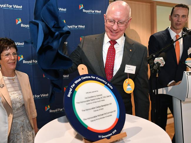 Newly appointed Australian Governor General David Hurley unveils a plaque at the launch of the new Royal Far West Centre for Country Kids in Sydney, Monday, December 17, 2018. (AAP Image/Joel Carrett) NO ARCHIVING