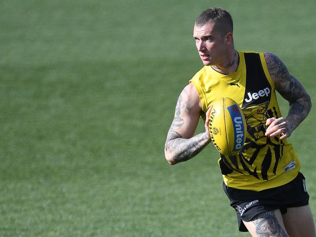 Dustin Martin’s football skills have afforded his father a huge amount of sympathy he doesn’t deserve. Picture: AAP/Julian Smith