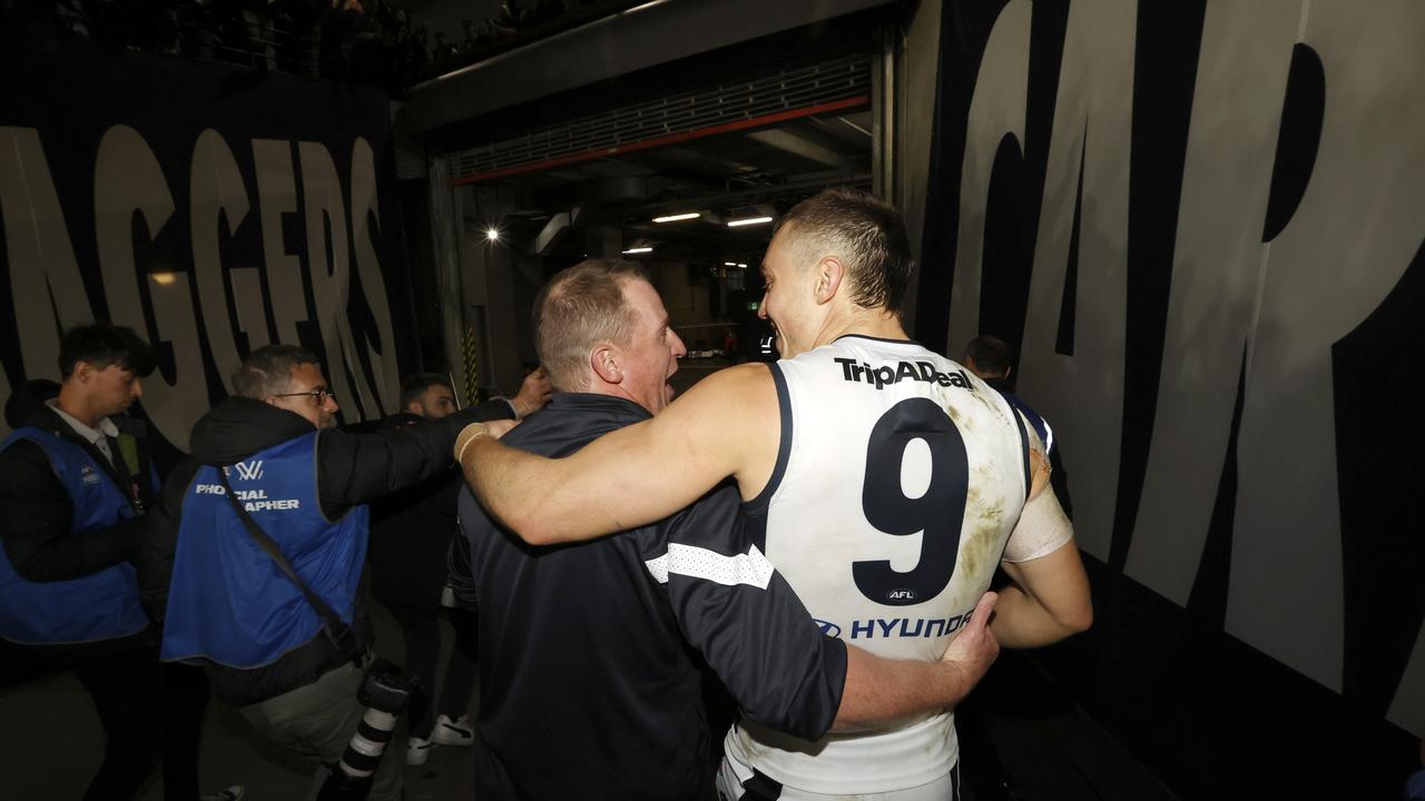 Michael Voss and Patrick Crippsembrace after the round 21 AFL match against St Kilda. Picture: Getty Images