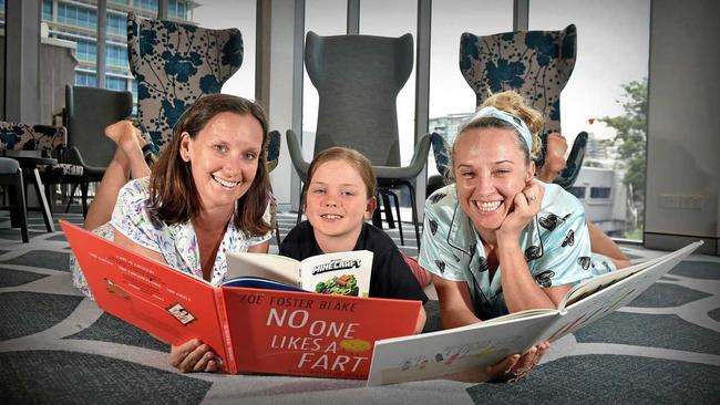 LOVE OF BOOKS: Pyjama angels Nikkii Joyce and Kathryn Stevens with her son Henry are ready for the upcoming Pyjama Foundation's Battle of the Brains Trivia Night. Picture: Patrick Woods