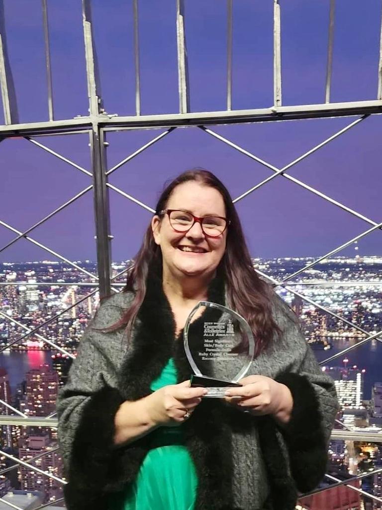 Roccoco Botanical founder Jacine Greenwood-Drummond in New York with her award.