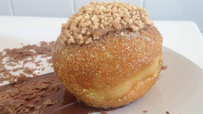 Aki Daikos from Dulwich Hill's Tella Ball Dessert Bar has announced two new desserts (the Golden Tella Ball and the Choc Crackle Tella Ball). Picture: Lisa Herbertson