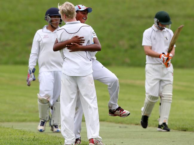 Collegians celebrating a wicket during the under 15 Div 2 Junior cricket grand final between Cobbitty Narellan (batting) v Collegians at Stromferry Oval, St Andrews. Picture: Jonathan Ng