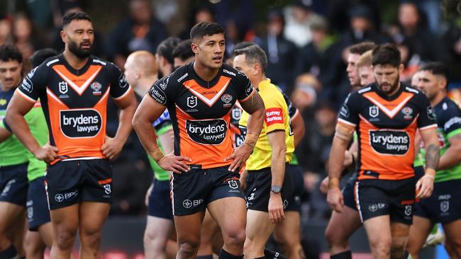 The Tigers look dejected after conceding yet another try. Picture: Mark Kolbe/Getty Images