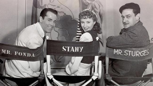 Actors Henry Fonda and Barbara Stanwyck with director Preston Sturges on the set of the film The Lady Eve in 1941.