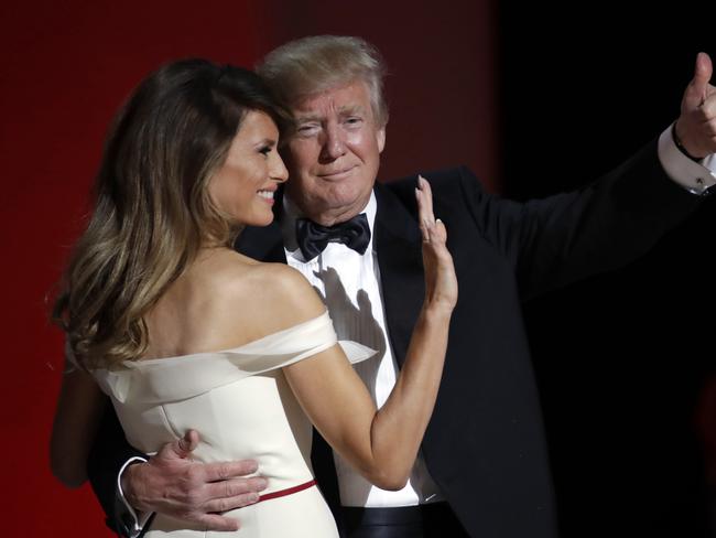 President Donald Trump dances with first lady Melania Trump at the Liberty Ball, Friday, Jan. 20, 2017, in Washington. (AP Photo/Patrick Semansky)