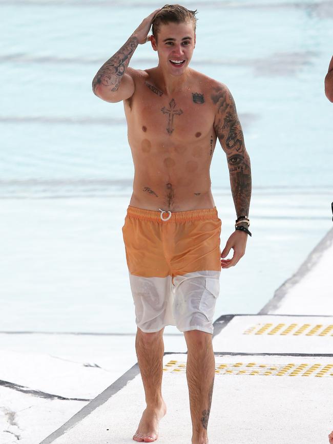 Justin Bieber spotted swimming at Bondi Iceberg in Sydney. Picture: KHAPGG/Matrix