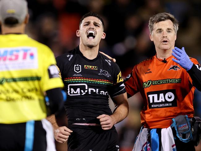 PENRITH, AUSTRALIA - AUGUST 15: Nathan Cleary of the Panthers reacts after taking a knock to his shoulder during the round 24 NRL match between Penrith Panthers and Melbourne Storm at BlueBet Stadium, on August 15, 2024, in Penrith, Australia. (Photo by Brendon Thorne/Getty Images)