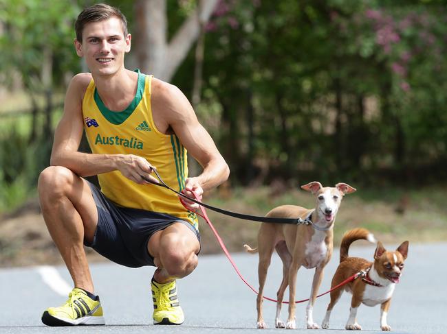 Dane Bird-Smith walking with his dogs Pina and Rocky.  Pic Peter Wallis