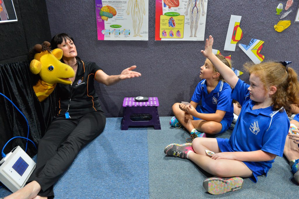 Students gain life skills from Harold the giraffe | The Courier Mail