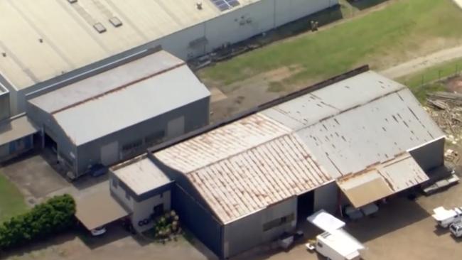 The body of Mr Walsh was found encased in concrete underneath a business at Coopers Plains. Image: Screen grab/Channel 7.