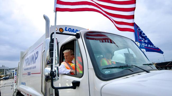 Donald Trump holds a press conference from inside a rubbish truck at Green Bay, Wisconsin. Picture: X