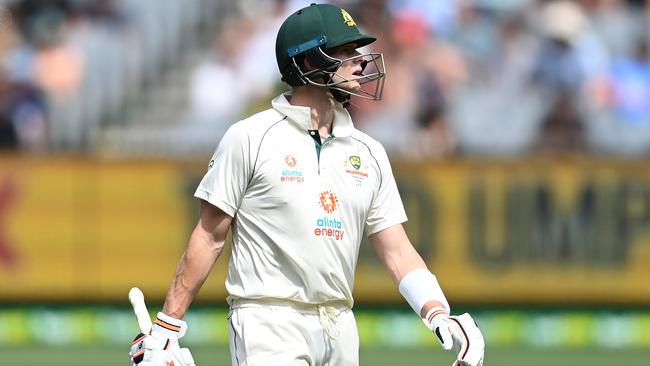 MELBOURNE, AUSTRALIA - DECEMBER 28: Steve Smith of Australia walks off the field after being dismissed by Jasprit Bumrah of India during day three of the Second Test match between Australia and India at Melbourne Cricket Ground on December 28, 2020 in Melbourne, Australia. (Photo by Quinn Rooney/Getty Images)