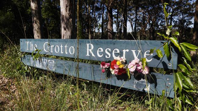 Community members have placed flowers at the entrance The Grotto Reserve bushwalking area in North Nowra in honour of Airlie. Picture: Richard Dobson