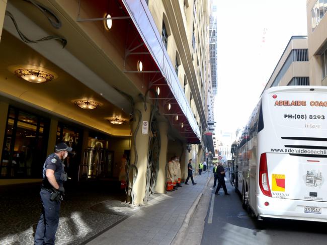 Passengers arrive at the Playford Hotel to start a 14 days of supervised quarantine after arriving in Adelaide on a mercy flight from Mumbai. The flight was second mercy flight repatriating Australians who were stranded abroad amid the coronavirus crisis. Photo By Kelly Barnes