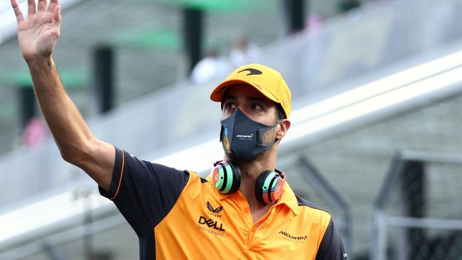 Daniel Ricciardo of Australia and McLaren waves to the crowd