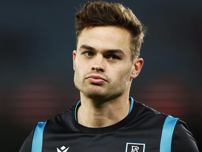 MELBOURNE, AUSTRALIA - AUGUST 14: Karl Amon of the Power looks on before the round 22 AFL match between the Essendon Bombers and the Port Adelaide Power at Marvel Stadium on August 14, 2022 in Melbourne, Australia. (Photo by Daniel Pockett/Getty Images)