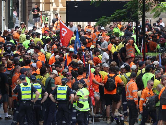 Furious tradies swarm parliament as toxic feud hits new low