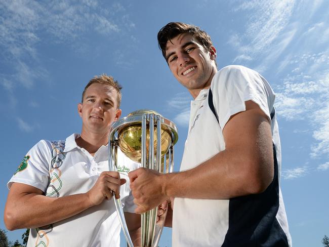 Nathan Hauritz and Pat Cummins (R) with the Cricket World Cup trophy at Coogee Oval.
