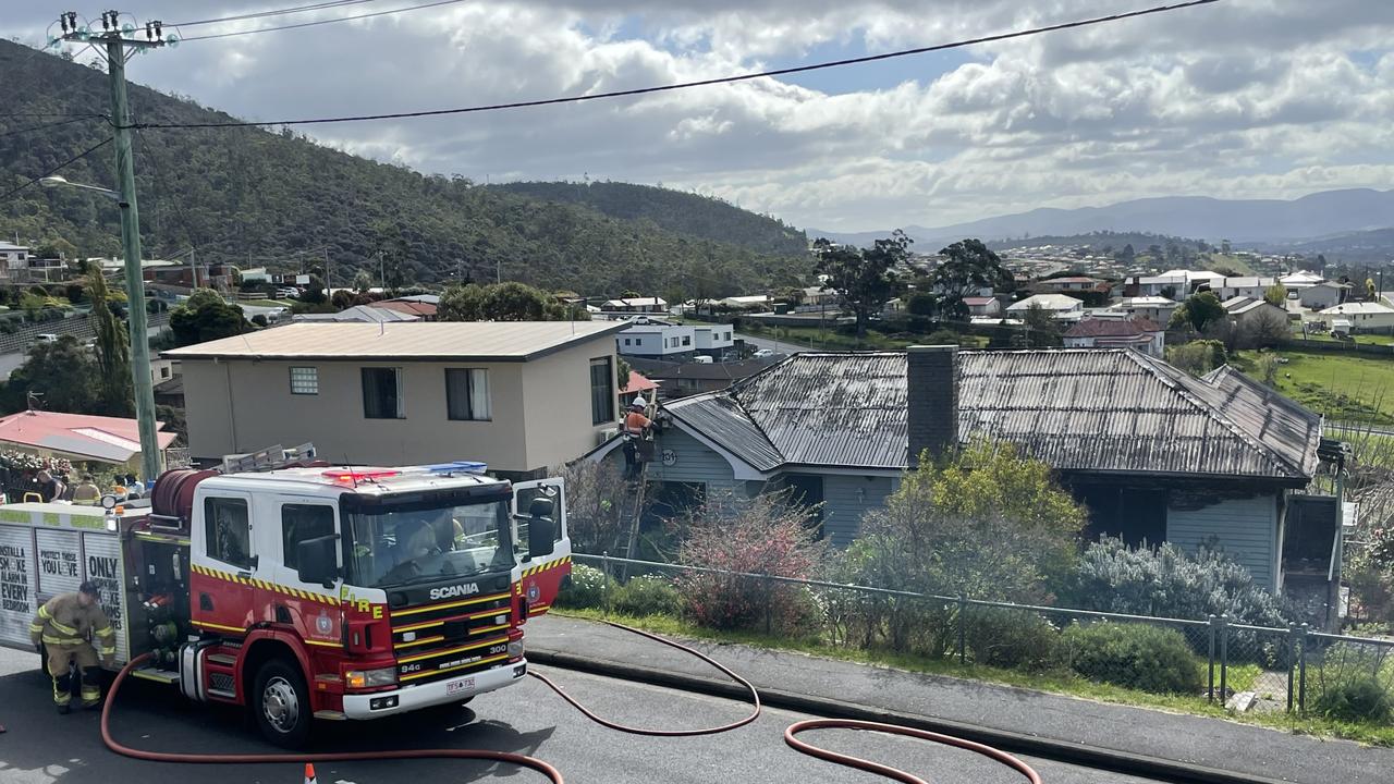 Fire and police crews attend a house fire at Marys Hope Rd in Berriedale. Pictures: Amber Wilson