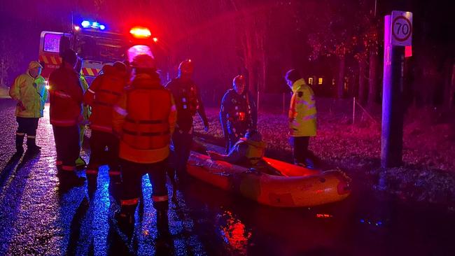 SES Blacktown unit rescue of an elderly lady and her greyhound who were isolated by floodwaters in Llandilo Rescue on Monday night. Picture: NSW SES