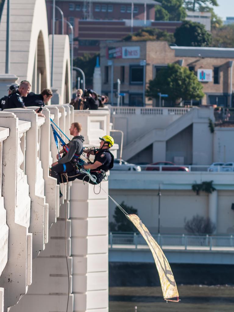 Extinction Rebellion protester abseiling William Jolly Bridge. 19 August 2019. Picture: Supplied.