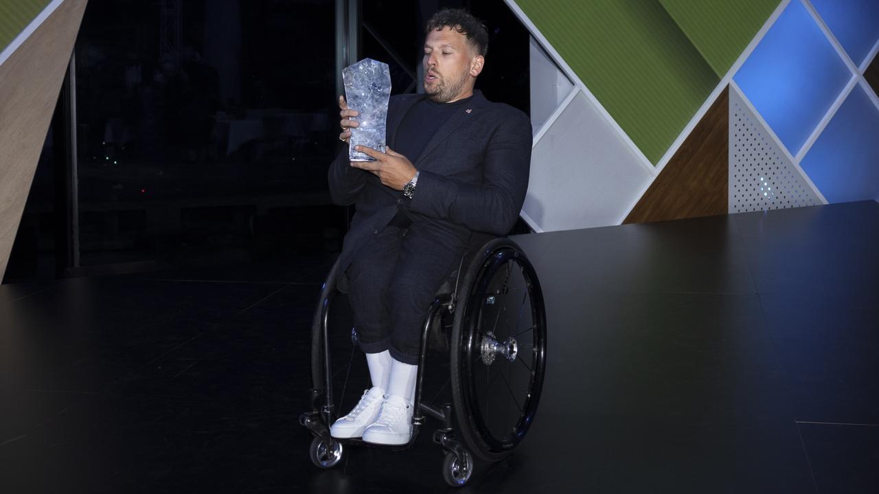 Dylan Alcott with the Australian of the Year award. Picture: Brook Mitchell/Getty