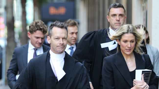 Network Ten counsel Matt Collins KC, left, arrives with other lawyers for the first day of the defamation trial at the Federal Court in Sydney. Picture: John Feder