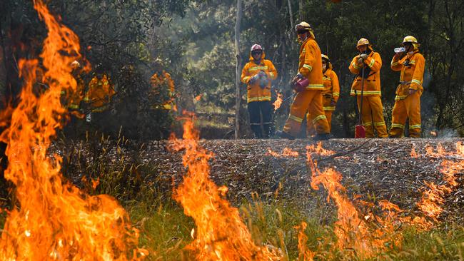 The premier has described Friday’s performance by emergency services as “a superb day of fire-fighting efforts”. Picture: Jason Edwards