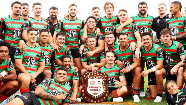 MUDGEE, AUSTRALIA - FEBRUARY 18: The Rabbitohs pose with the Charity Shield as they celebrate victory during the NRL Trial and Charity Shield match between St George Illawarra Dragons and South Sydney Rabbitohs at Glen Willow Sporting Complex on February 18, 2023 in Mudgee, Australia. (Photo by Mark Kolbe/Getty Images)