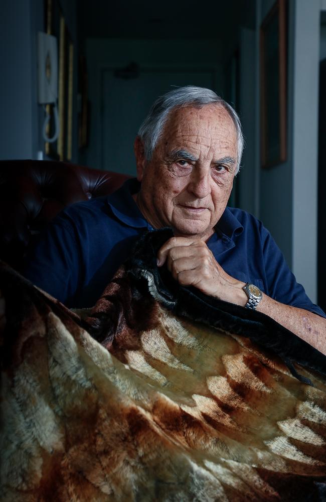 Holocaust survivor Peter Baruch with the blanket made in his grandfather’s factory in Lodz that he was wrapped in when he was forced to flee the Nazis as a small child. Picture: Glenn Campbell.