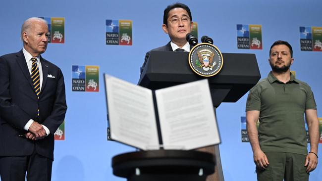 Joe Biden and Volodymyr Zelensky listen to Japan's Prime Minister Fumio Kishida speak at an event with G7 leaders during the NATO Summit in Vilnius last week. Picture: AFP