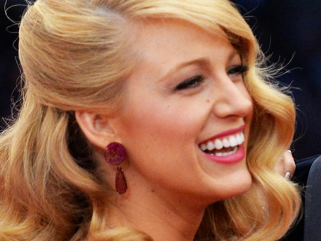 NEW YORK, NY - MAY 05: Actors Blake Lively (L) and Ryan Reynolds attend the "Charles James: Beyond Fashion" Costume Institute Gala at the Metropolitan Museum of Art on May 5, 2014 in New York City. (Photo by Mike Coppola/Getty Images)