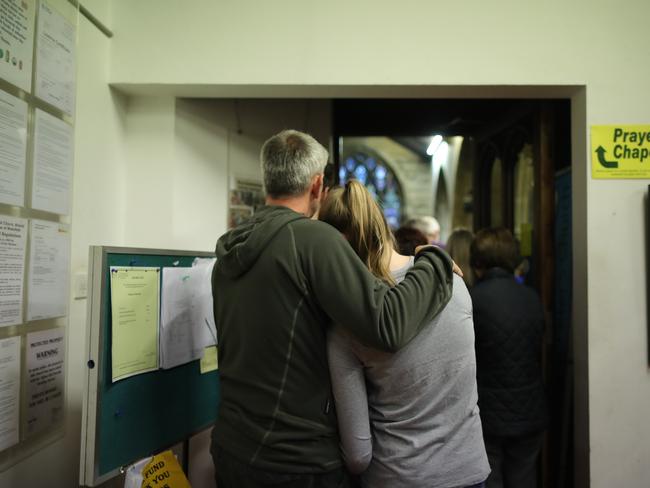 People at a church in Birstall at a vigil for the Labour MP. Picture: Christopher Furlong/Getty Images.