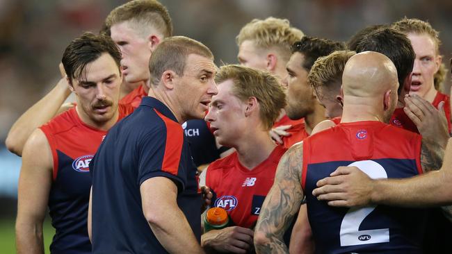 Demons coach Simon Goodwin addresses his players at three-quarter-time. Picture: Getty Images