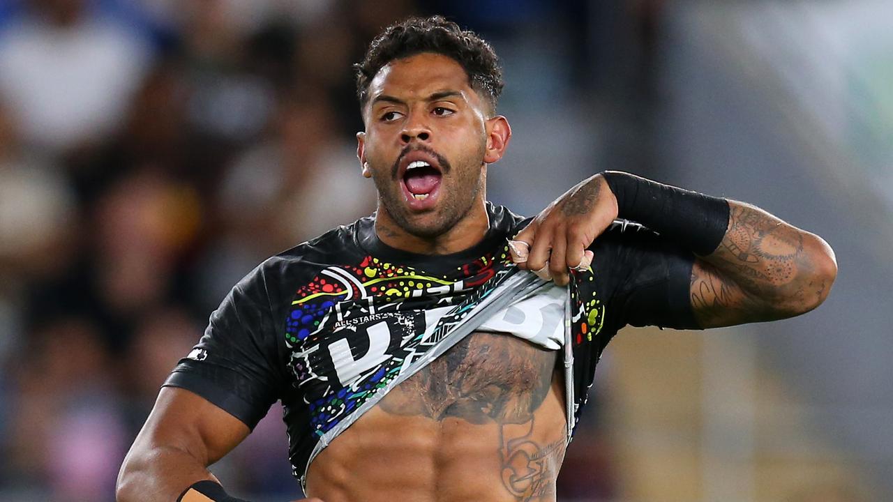 Josh Addo-Carr of the Indigenous All-Stars points to his skin before the game last year.