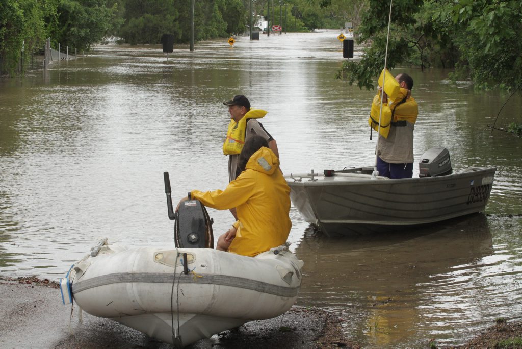 Boaties wait to ferry grocies across to Granville store that had run out of supplies. Photo: Robyne Cuerel / Fraser Coast Chronicle. Picture: Robyne Cuerel