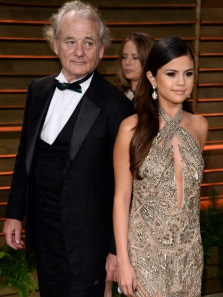 Bill Murray and Selena Gomez arrive at the 2014 Vanity Fair Oscar Party on March 2, 2014 in West Hollywood. Picture: Getty