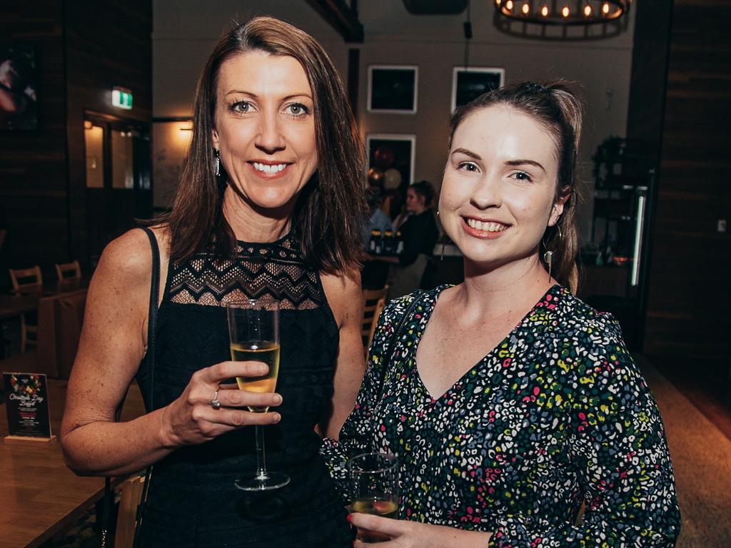 Kristy Hayes and Katrina Rojek at The Spotted Cow reopening in Toowoomba. Socials: Damien Anthony Rossi | Picture: Ali Rasoul