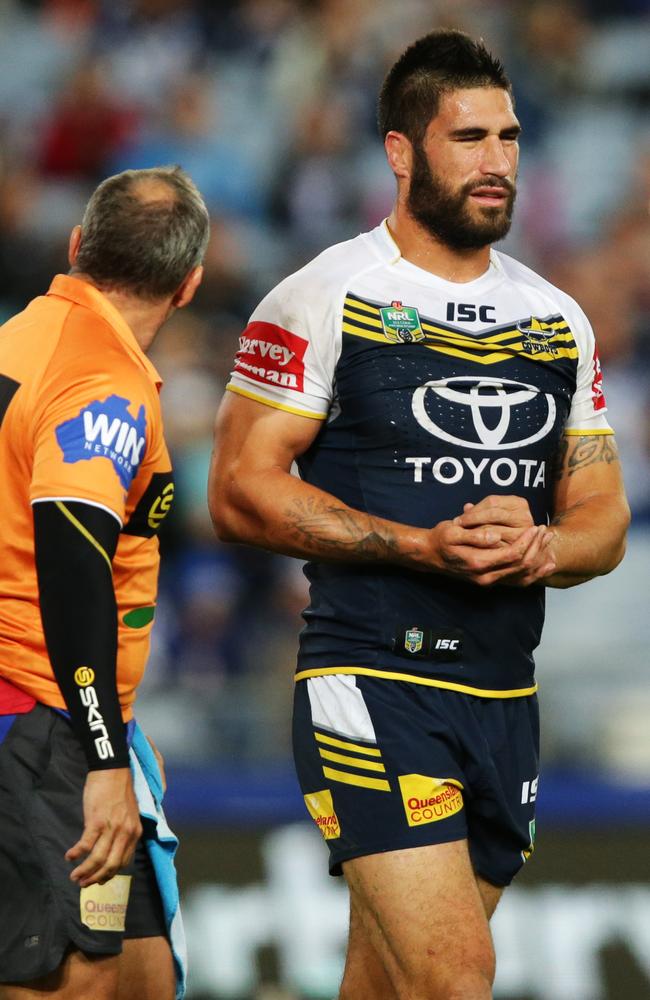 Cowboy's James Tamou goes off injured.