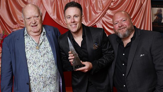 Veteran Aussie music champion Michael Chugg and country music tastemaker Dan Biddle celebrate Casey Barnes’ ARIA win last week. Picture: Getty.